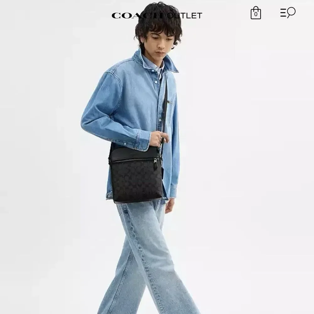 Coach canvas zip